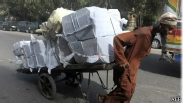 man pulling a cart-afp