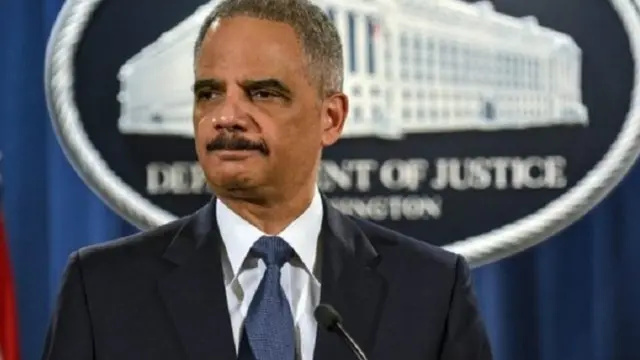 وصف هولدر فيرغسون بأنها مجتمع يستخدم فيه المسؤولون سلطات الامن للحصول على الدخل