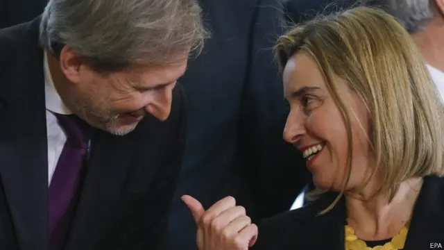 Могерини и Ханн