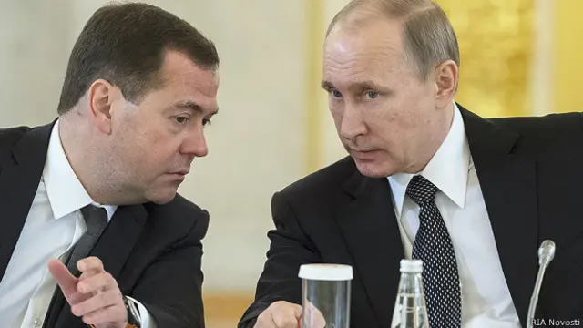 Медведев и Путин