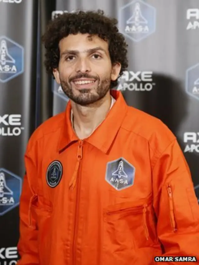 Омар Самра в космическом комбинезоне