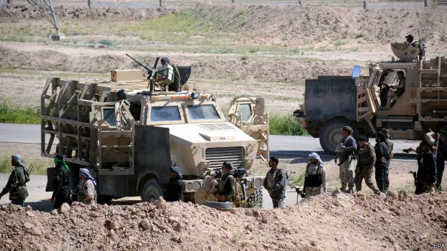 يساند 20 ألف متطوع شيعي وعدد قليل من السنة الجيش العراقي في معركته لطرد مسلحي تنظيم "الدولة الإسلامية" من تكريت.