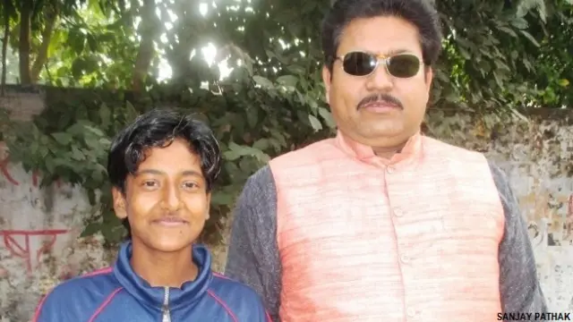 निशा कुमार और उनके कोच संजय पाठक