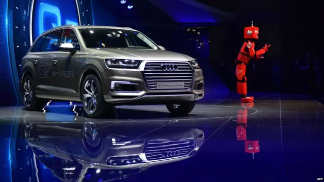 An Audi Q7 e-tron car is pictured during a presentation at the 16th Shanghai International Automobile Industry Exhibition in Shanghai on April 20, 2015.