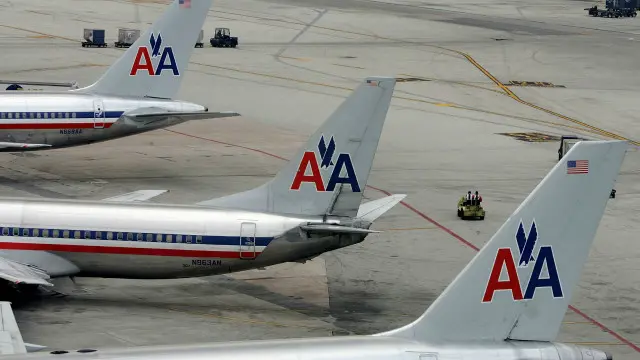 أكدت شرطة طيران AA أنها " استطاعت اصلاح المشكلة التي طرأت على برامج الآيباد"