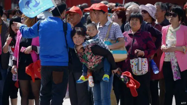 Turistas chineses (Foto: AFP)