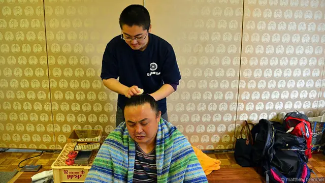 Прически борцов напоминают о том, как носили волосы самураи