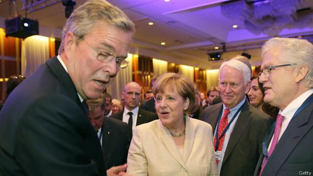 Джеб Буш (слева) и Ангела Меркель