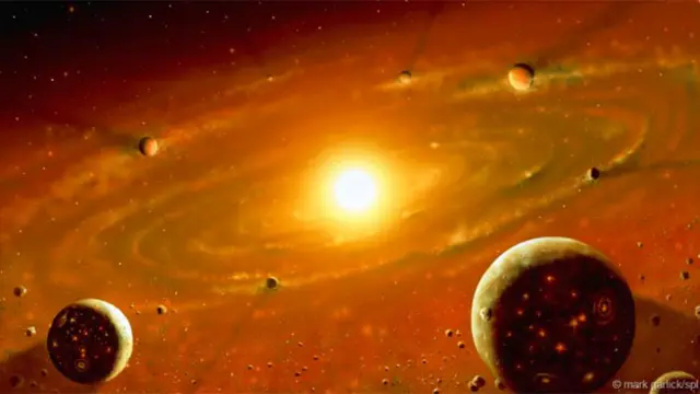 成群的小块岩石聚集在一起就形成行星（图片：Mark Garlick/SPL)