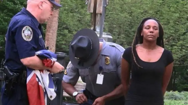 Newsome dan seorang pria yang membantu penurunan bendera itu kemudian ditangkap aparat polisi setempat. Bendera itu kemudian kembali dikibarkan pada tiang tersebut.