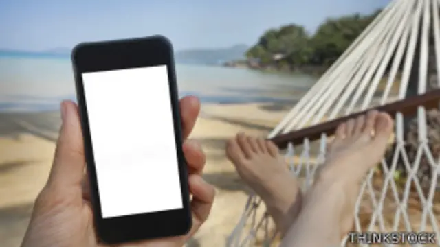 Usuario de celular de vacaciones