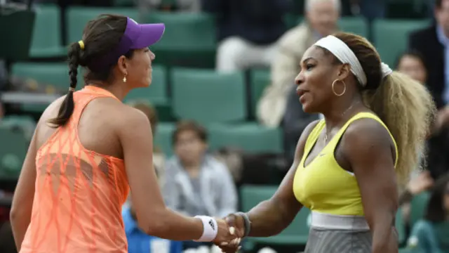 小威(右)与穆古鲁扎激烈交锋后获胜