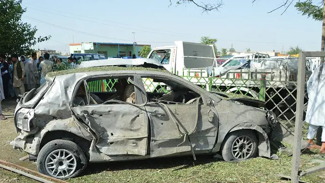 ہلاک ہونے والے عام شہری قریب ہی گاڑی میں بیٹھے چیک پوائنٹ سے گزرنے کا انتظار کر رہے تھے
