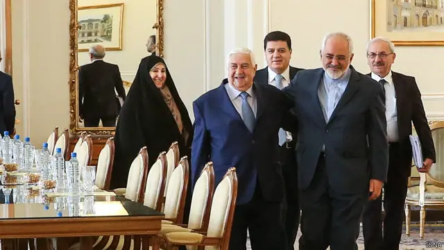 محمد جواد ظریف و ولید معلم در تهران. مرضیه افخم، سخنگوی وزارت امور خارجه ایران هم در عکس دیده می‌شود