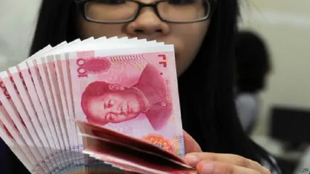 لماذا خفضت الصين قيمة عملتها؟