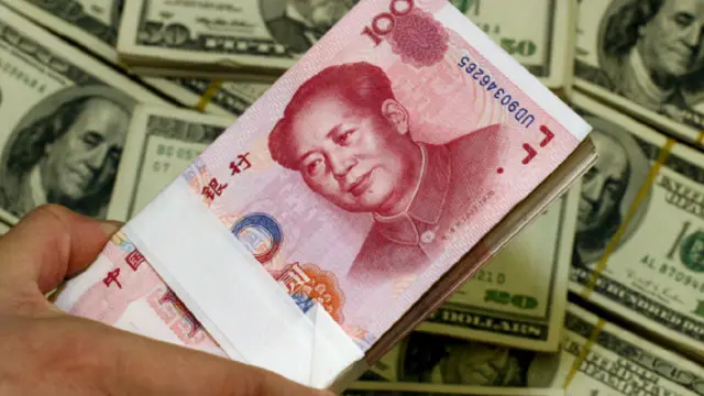 Giới chuyên gia cảnh báo việc phá giá đồng nhân dân tệ có thể khiến kinh tế Việt Nam thêm phụ thuộc vào Trung Quốc do nhập siêu gia tăng
