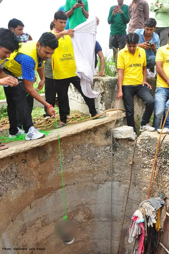 baby in well, rajasthan, jaipur