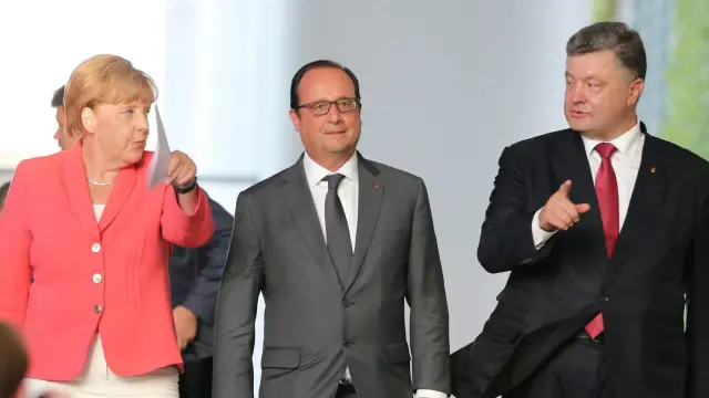 Лідери Німеччини, Франції, Уакраїни після переговорів у Парижі 