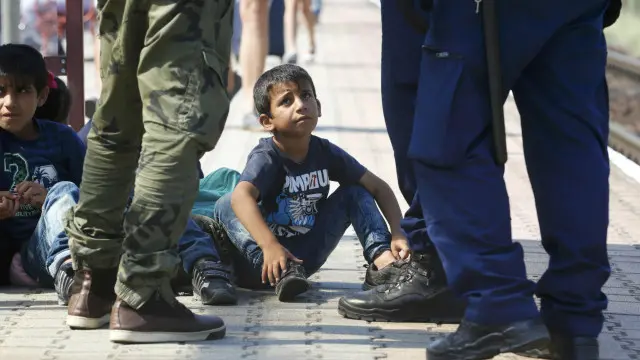 Хлопчик-мігрант