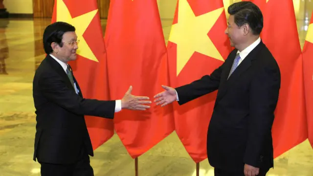 Ông Trương Tấn Sang và ông Tập Cận Bình trong cuộc gặp hôm 3/9 đều nói cần "xử lý đúng đắn" các bất đồng về biển Đông