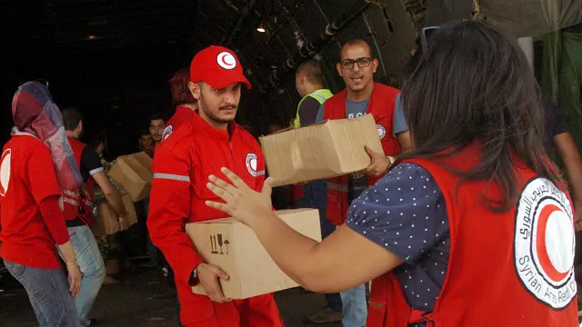 الصورة التي بثتها وكالة الأنباء الرسمية لوصول "المساعدات" الروسية