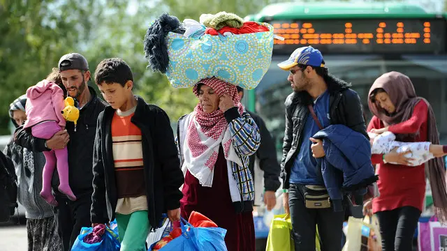 Шанба куни Мюнхенга 13 мингдан кўпроқ муҳожирлар келган