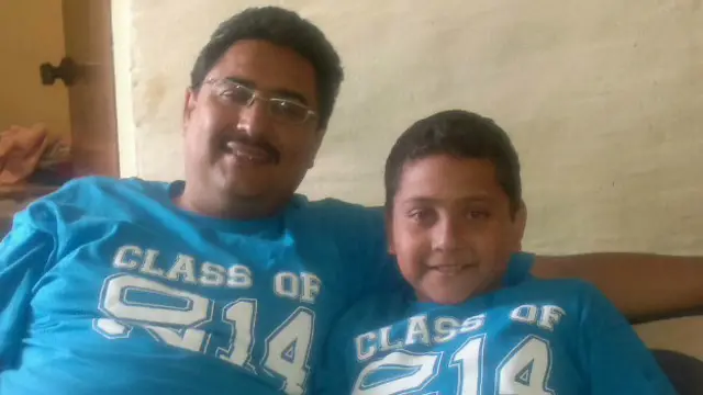 Israel Martínez con su hijo