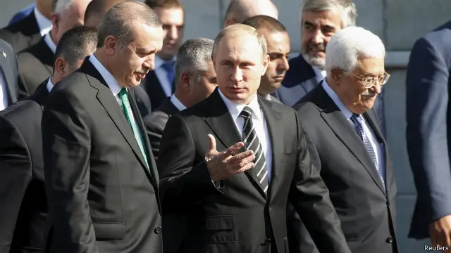 رافق بوتين في حفل الافتتاح الرئيس التركي رجب طيب اردوغان والرئيس الفلسطيني محمود عباس