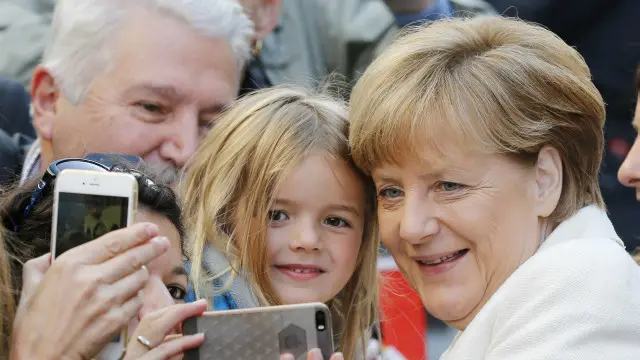 меркель с поклонниками