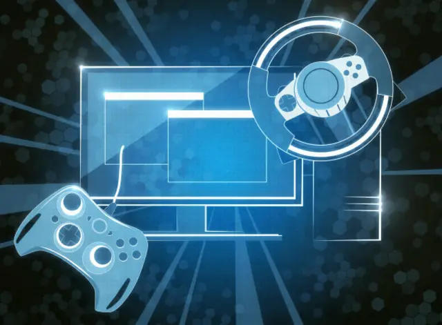 Экран компьютера с игровой приставкой