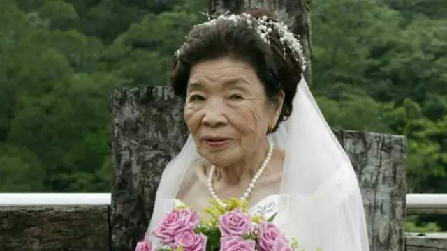 小桃阿嬤之前參加基金會的舉辦婚紗圓夢計畫