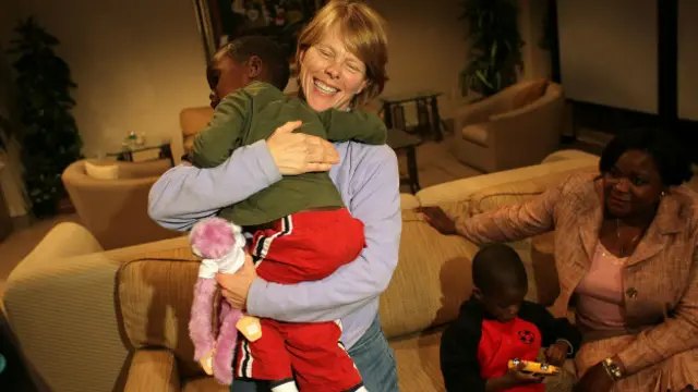 американські батьки гаїтянських сиріт