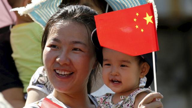 Китайская женщина с ребенком