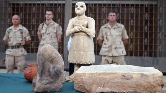 這尊古蘇美爾雕像是2003年從巴格達伊拉克國家博物館中被哄搶的成千上萬件文物中的一件（圖片來源： AFP/Getty Images）