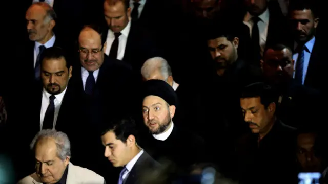 نوری مالکی و عمار حکیم در تشییع جنازه چلبی