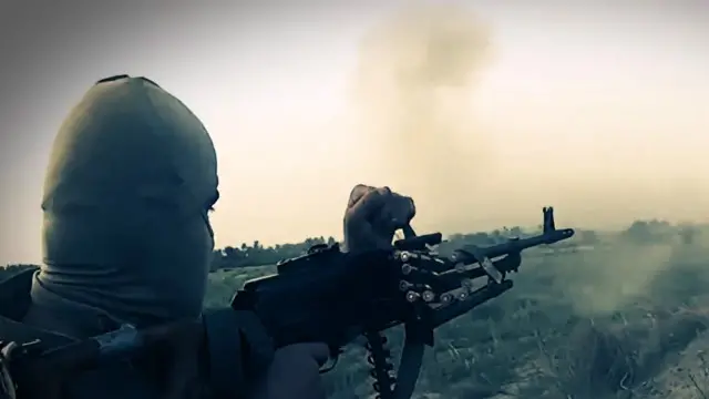 "Кремл ва Қавқозни олиш" таҳдиди янграган видеобаёнотдан олинган сурат. 