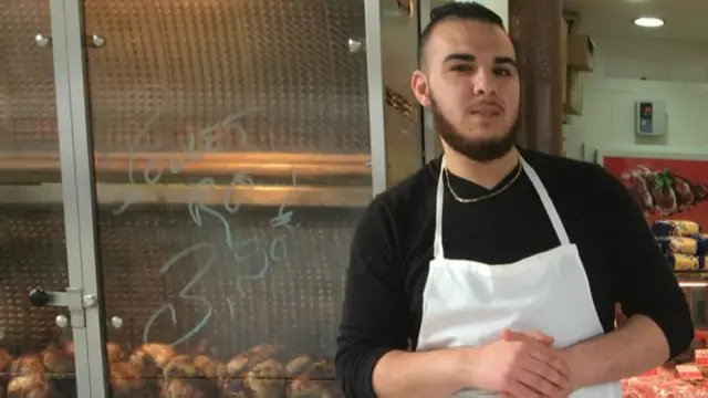 "У них - своя жизнь, у нас - своя", - говорит работник халяльного магазина Атек Рилез