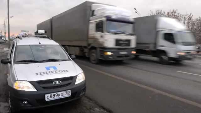 Автомобиль с логотипом системы "платон"