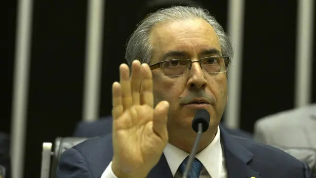 O deputado Eduardo Cunha (PMDB-RJ) na sessãoganhar dinheiro no futebolque leu o pedidoganhar dinheiro no futebolimpeachment da presidente Dilma Rousseff