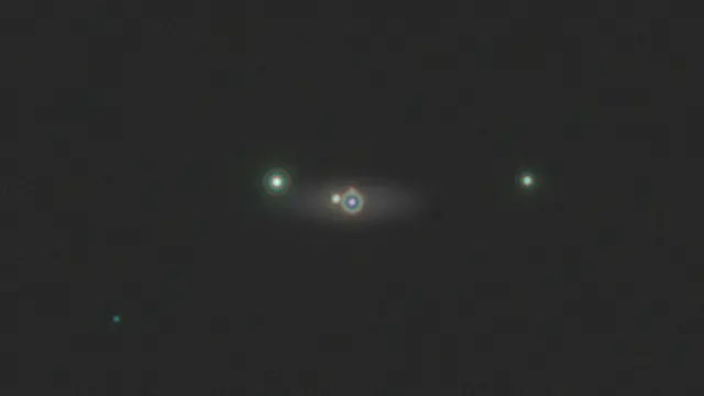 На этом рисунке изображена Солнечная система, какой ее увидел бы с расстояния в миллионы километров телескоп, снабженный Starshade