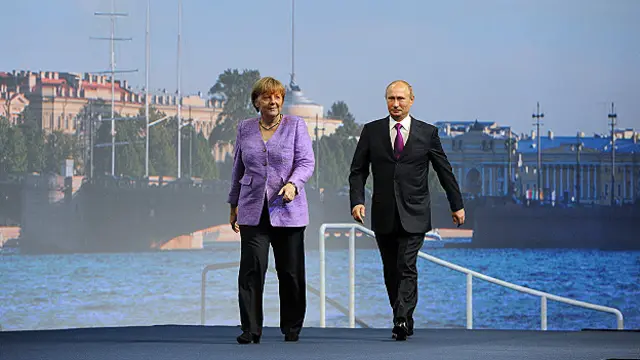 Putin y Merkel