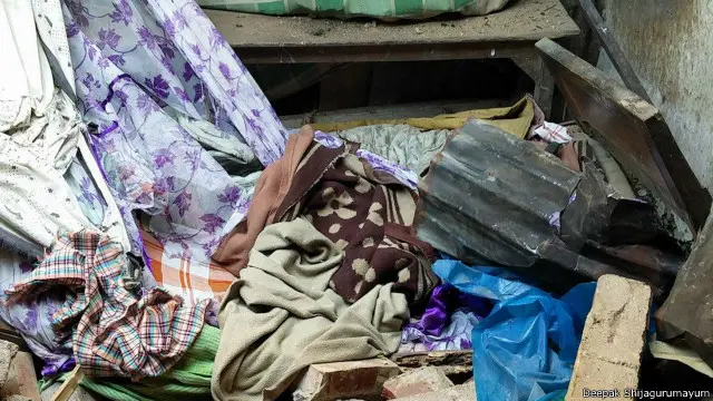 भूकंप में गिरी इमारत