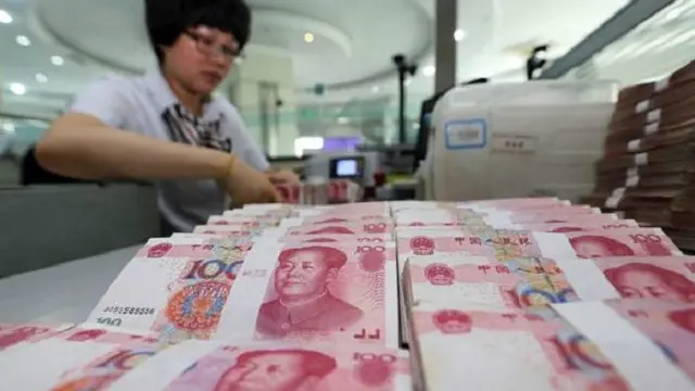 تأثيرات خفض اليوان سلبية