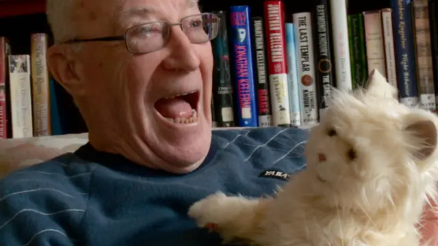 Джим Макгакен с котом Аланом