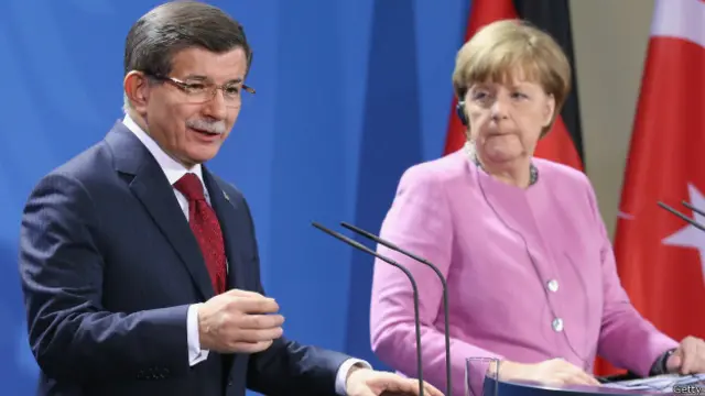 एंगेला मर्केल और अहमत दावातोग्लु