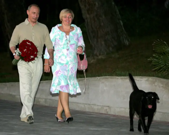 Чета Путиных с лабрадором Кони