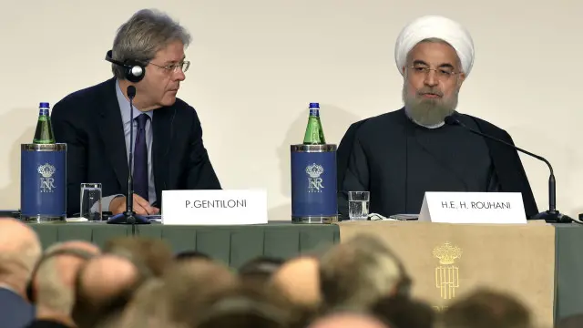حسن روحانی و پائولو جنتیلونی، وزیر امور خارجه ایتالیا در نشست مشترک بازرگانی در رم