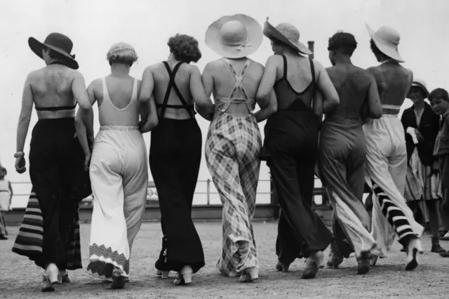 Fashion conscious girls in beach pyjamas