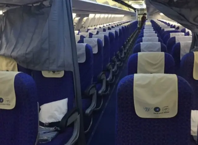 Ruangan yang lega, layanan pribadi dan tak ada tangisan bayi di pesawat ini.