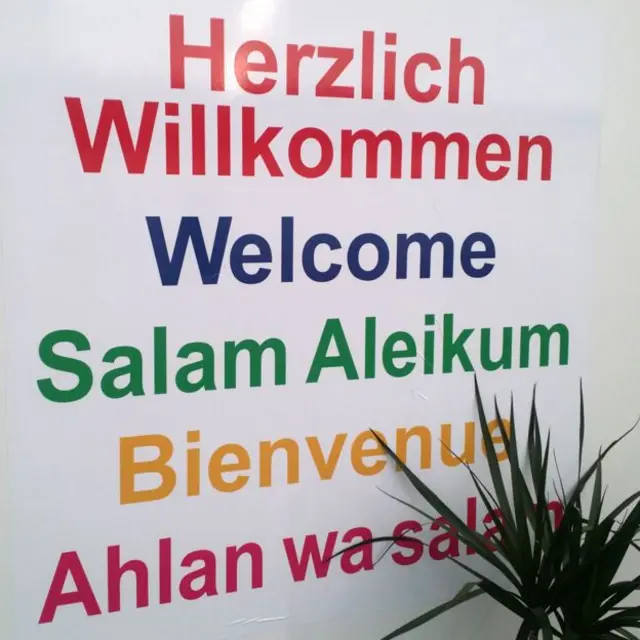 德国几乎是一夜间就向一百万陌生人敞开了大门